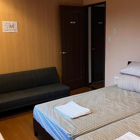 Atami Onsen Guest House Megumi Buitenkant foto